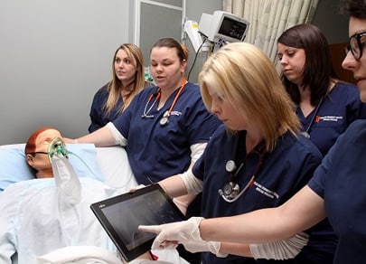 picture of students practicing medical procedures 