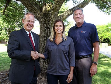 Photo of Tim Hood, Joan Strong, and Jeff Reinke