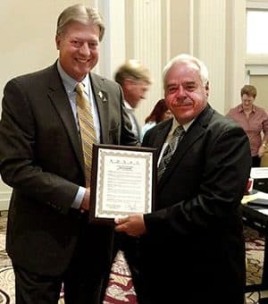 Photo of Fritz Larsen honoring Jim Endress