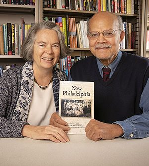 Kate Williams and Gerald McWorter with their book New Philadelphia