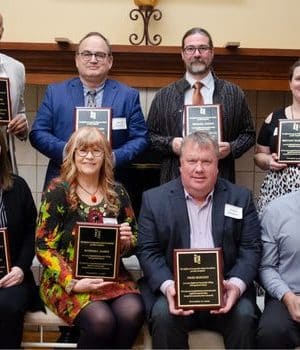 Distinguished Alumni L-R back row: Antwon Harris, D. Antonio Cantu, Michael Maher, Brittany Blomberg front row: Connie Kraft, Barbara James, Fred Bonnet, Dave Bergemann