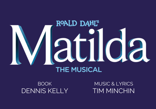 Roald Dahl's Matilda The Musical in white with a blue outline over a purple back ground. Book by Dennis Kelly and Music and Lyrics by Tim Minchin appear under the logo.