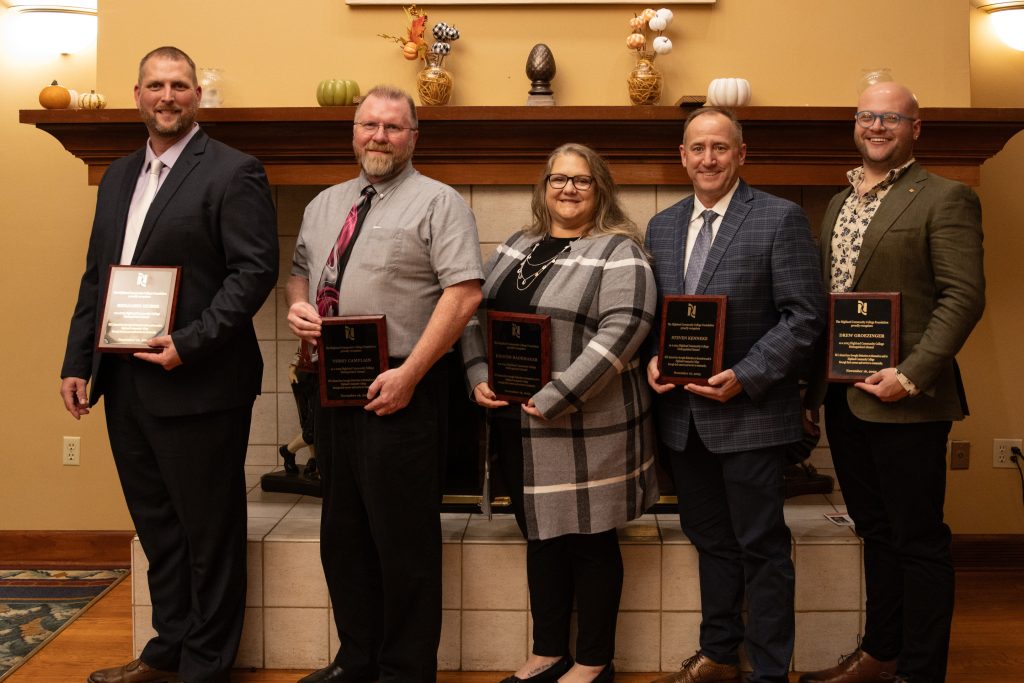 2023 Distinguished Alumni recipients pictured with their awards from left to right: Terry Camplain, Kristin Rademaker, Steven Kenneke, and Drew Grosinger