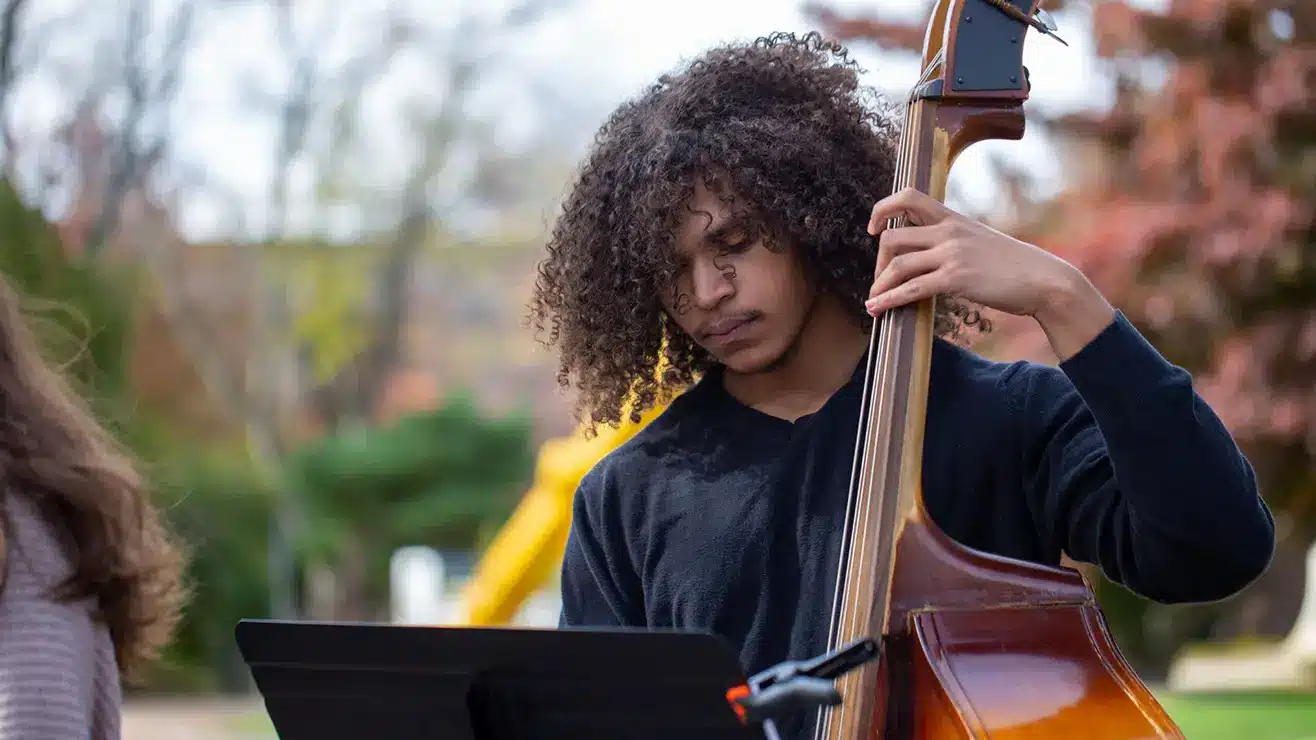 Student playing the double bass