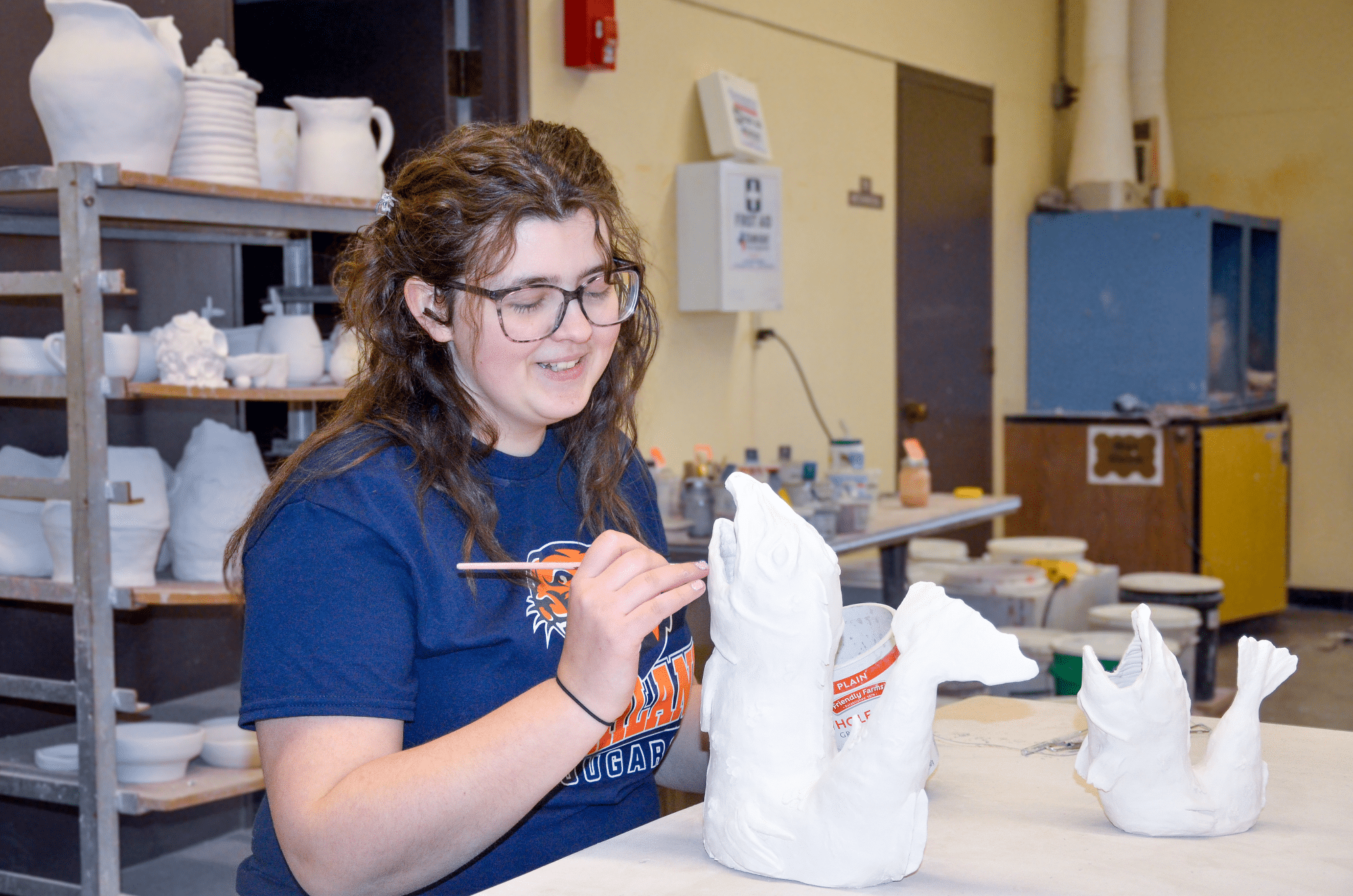 A student works on an art project.