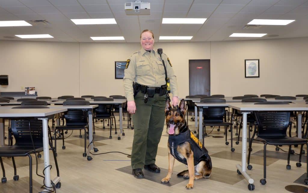 An officer with a dog