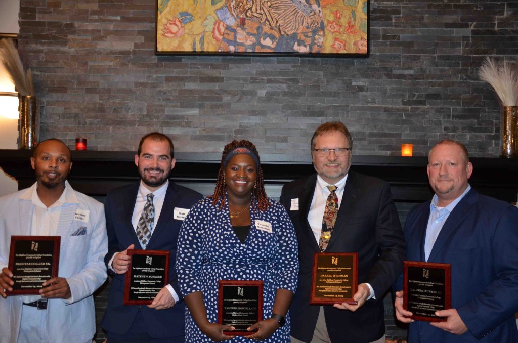 Highland's five distinguished alumni for 2024 are pictured with their plaques.