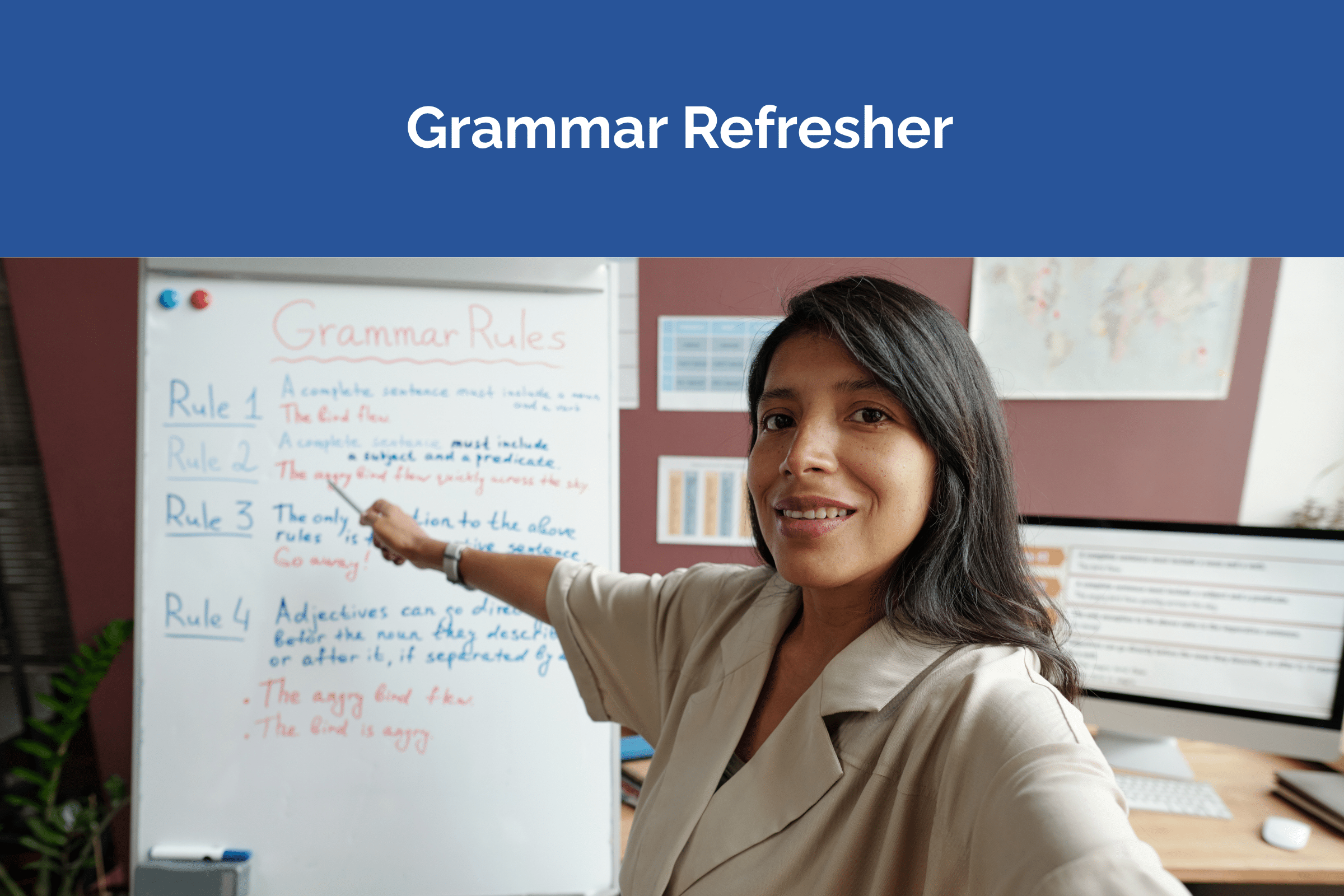 woman pointing to grammar rules on whiteboard