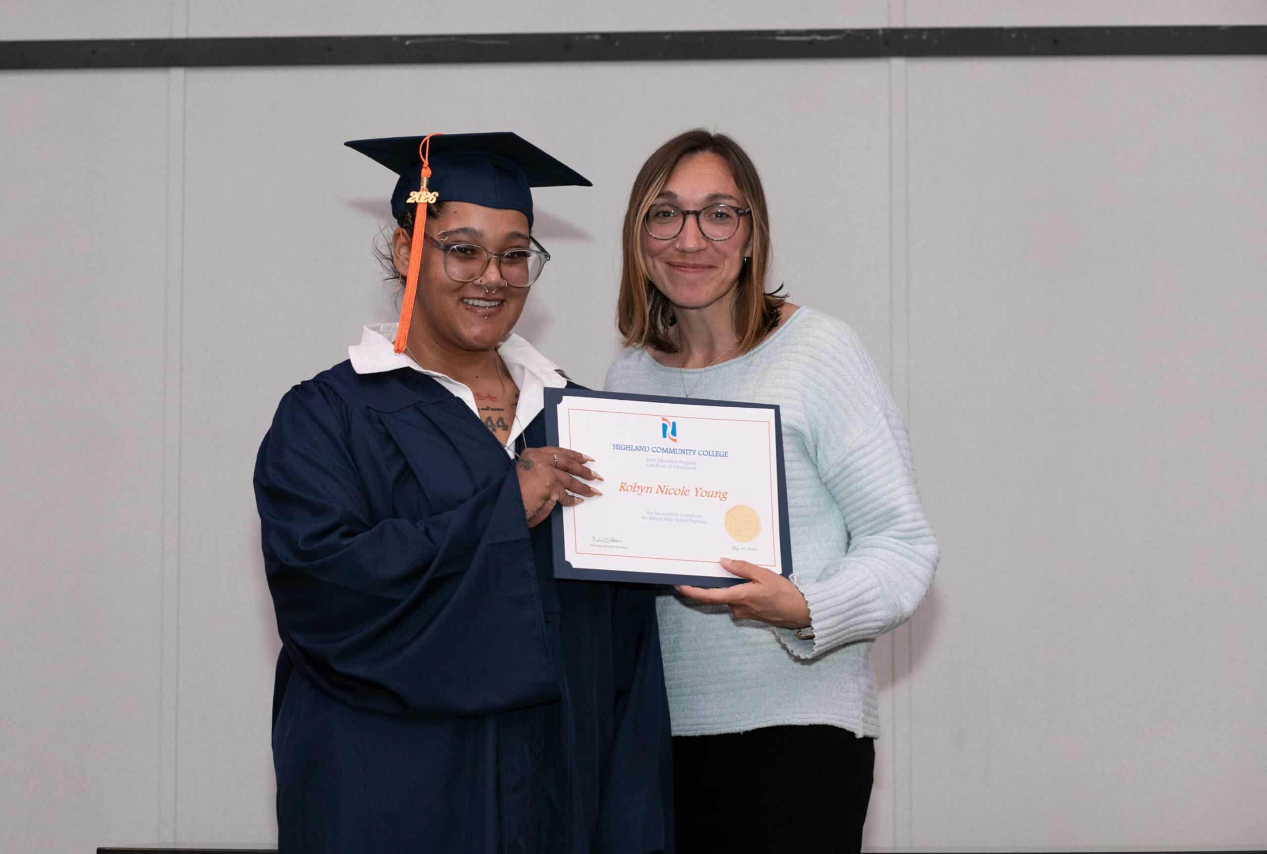 GED Graduate getting her diploma
